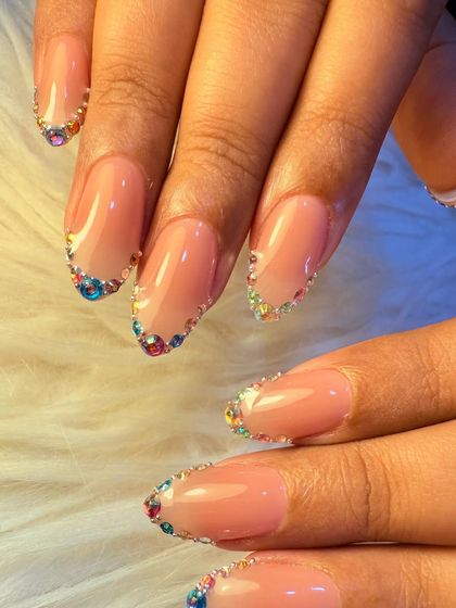 Another angle of the rainbow crystal design, showing how the light catches the different colored stones. It's a perfect party or festive manicure.