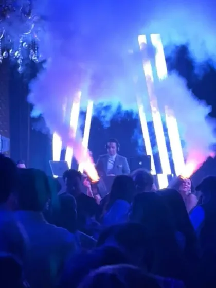 A shot from a massive wedding with mad beats. The smoke effects add to the drama and excitement on the dance floor.