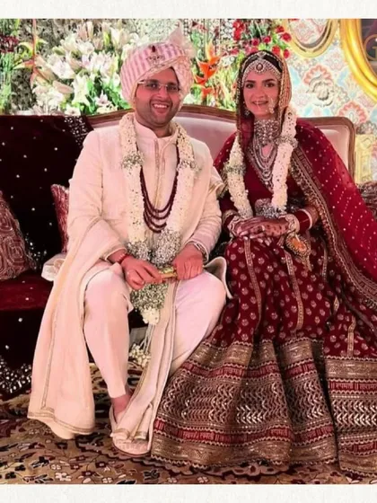 This couple's smile makes me believe in love all over again. Seated in regal attire, their happiness is the reason I am so passionate about what I do.