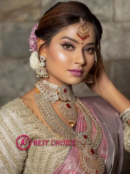 A close-up shot that highlights the detailed craftsmanship of the AD choker and jhumkas.