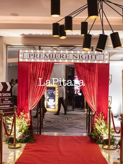 Welcome to the premiere. For a Bollywood-themed 90th birthday, we created a complete red carpet entrance experience. With velvet ropes, a "Premiere Night" marquee, and a paparazzo silhouette, we set the stage for a glamorous and immersive celebration from the moment guests arrived.