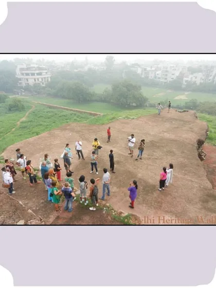 An aerial view of a group gathered on the upper platform of Bijay Mandal. This vantage point was likely used by the Sultan to survey his city and troops.