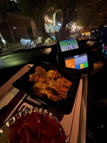 The perfect setup: delicious food from Degnama and a live cricket match. This content is highly relatable and showcases a brand as part of an ideal everyday experience.