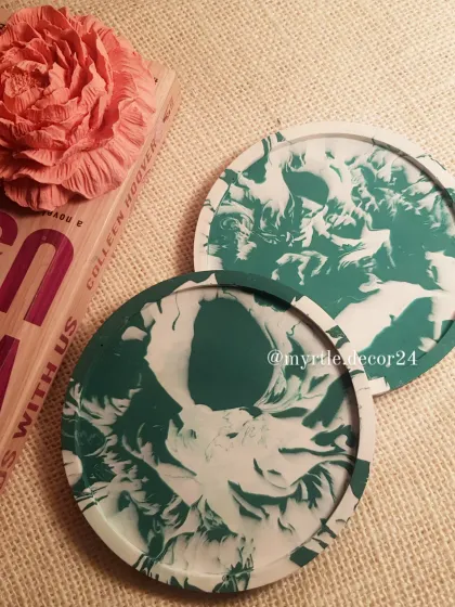 Our green marble coasters styled with a pink Peony diffuser. We love mixing and matching colors and shapes from our collection.