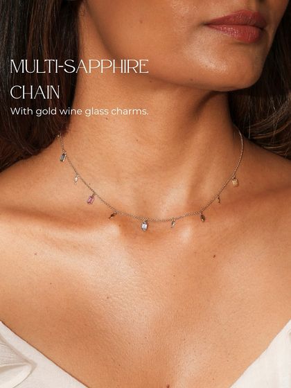 A fun and playful piece, this multi-sapphire chain is adorned with tiny gold wine glass charms. It's where gemstones meet good times.