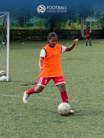 A player takes a powerful shot on goal during a practice session, a result of our focused striker training.