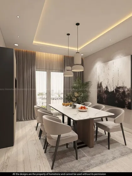 This dining area features a modern crockery unit with a mix of closed and open storage. The design is clean, functional, and stylish.
