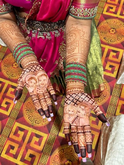 Portrait mehendi is a wonderful way to celebrate your family. For this engagement, I created portraits of the couple and their family members on the palms, making the design incredibly personal.