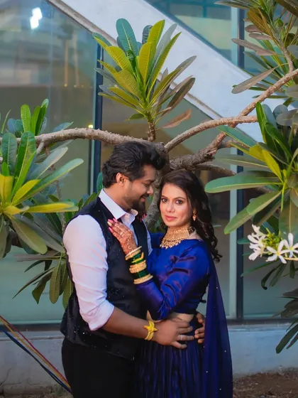 Another beautiful shot of the couple. The bride's makeup is bold yet elegant, perfect for making a statement.