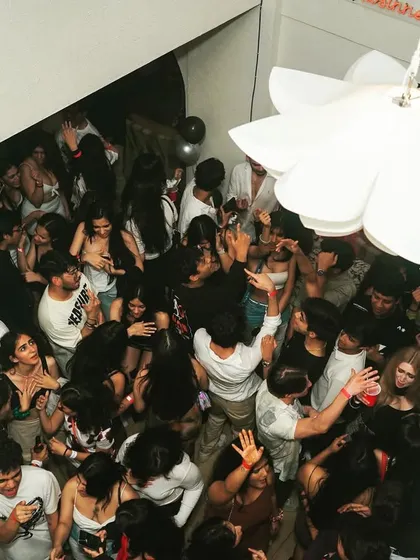 An overhead view of a packed party. When the dance floor is this crazy, you know I'm on the console.