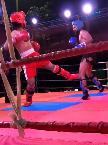 A powerful leg kick from our fighter during the final match of the low kick division.
