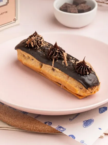 My Classic Chocolate Eclair is a taste of Paris. It's made from choux pastry, filled with a smooth vanilla pastry cream, and topped with a glossy chocolate ganache.