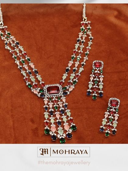 A vibrant multi-colored gemstone and AD necklace. This piece is perfect for adding a playful yet elegant touch to your outfit.