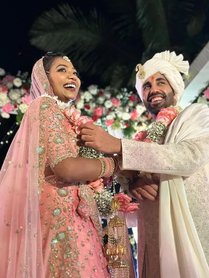 The same contagious smiles, capturing the pure happiness of this beautiful couple at their Goa wedding.