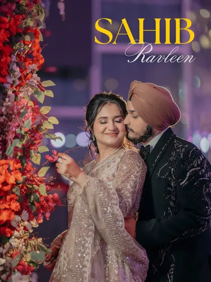 An embrace that feels like home. We seek out these tender, heartfelt moments during your celebrations, where a gentle kiss and a happy sigh tell a story of deep affection and comfort, beautifully framed by floral splendor.