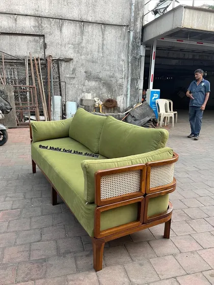 Side view of the green sofa.