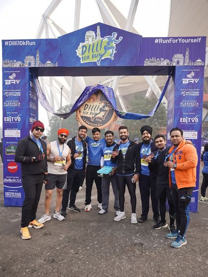 The crew posing at the finish line of the Dilli 10K run. We run together, we celebrate together.