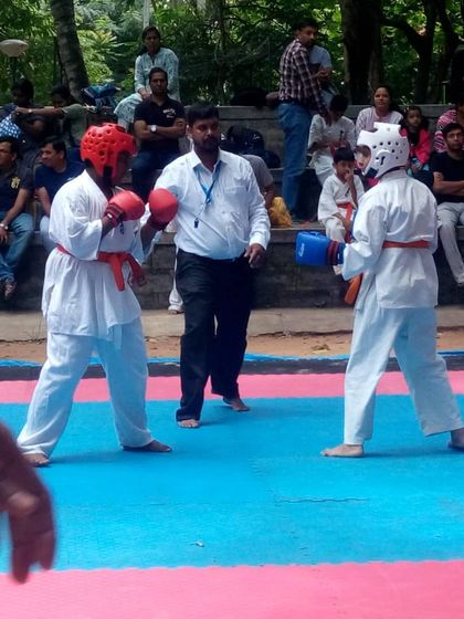Two young karateka ready for action. The focus in their stance shows their dedication to the art.