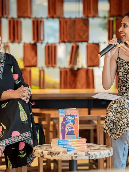 The dynamic between an author and interviewer is key. Here, Stuti Changle and our host share a moment of connection during the book reading event.