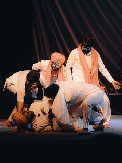Actors perform an emotional scene from a play depicting the Jallianwala Bagh massacre. My photography aims to convey the deep emotion and historical weight of such theatrical performances.