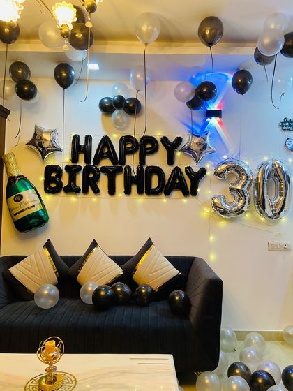 This image shows the full scope of the 30th birthday living room decoration, ready for the party.