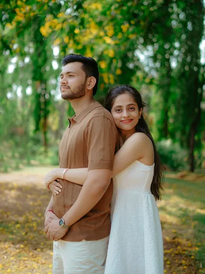 A quiet, loving pose in a sun-dappled park. This portrait of Umesh and Janhavi is serene, warm, and full of emotion.