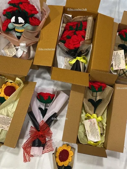 A behind-the-scenes look at my workspace with multiple orders packed and ready to ship. Each box contains a unique, handmade creation, a piece of someone's dream ready to be delivered.