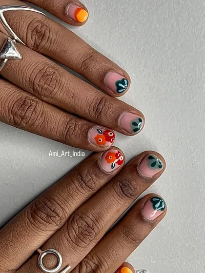 A beautiful and artistic set with abstract floral designs in orange and green.