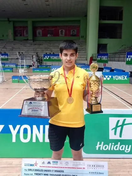 Anmol Kharab, one of our star athletes, holding her trophies after being selected for the National Junior Camp. This is a stepping stone to representing India at the international level.