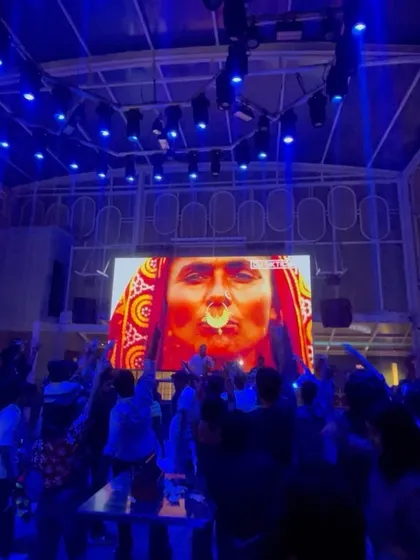 A powerful visual of a Rajasthani woman on the screen during my Independence Day set, celebrating the diverse culture of India through music and visuals.