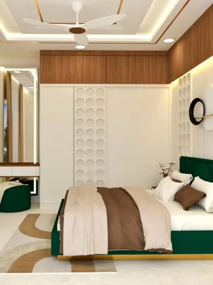 Another view of the green and white bedroom, showing the integrated vanity area. The design is cohesive, stylish, and practical.