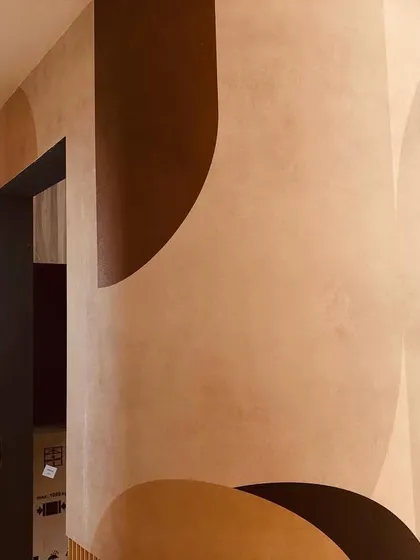 A closer look at the curved wall installation, highlighting the clean finish around the doorway. No matter the shape of the wall, I ensure the wallpaper fits perfectly.