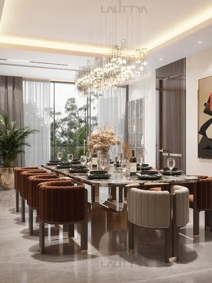 Dining in elegance, where every detail tells a story. This stunning dining room features rich textures, warm tones of rust and cream, and sleek lines, creating a space that is both welcoming and refined.