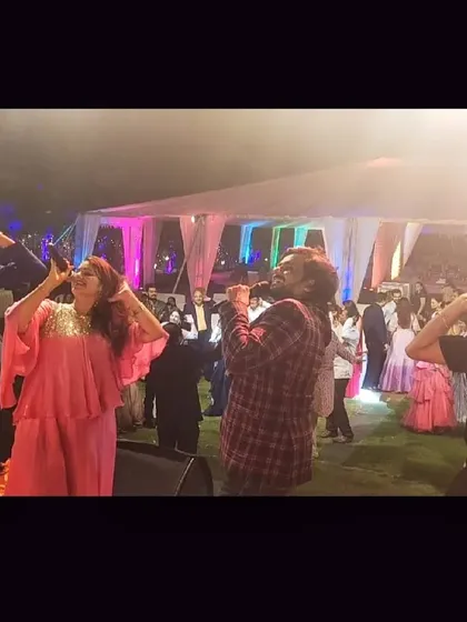 The entire band lost in the music during a fantastic Sangeet night. This is the passion and energy we bring to every single wedding event.