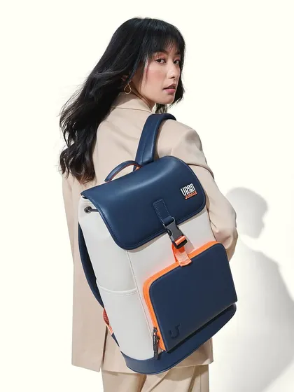 A chic and sophisticated look for a backpack campaign. The makeup is polished and elegant, with a defined eye and a soft lip, showing that even a casual accessory can be styled with a touch of glamour.