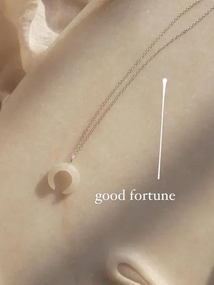 A trio of my crescent pendants. The peach moonstone for emotional stability, the grey moonstone for new beginnings, and the white moonstone for good fortune.