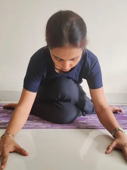 Yin yoga is a meditative practice that helps balance a dynamic 'Yang' lifestyle. This seated forward bend targets the deep connective tissues, improves flexibility, and calms the nervous system.