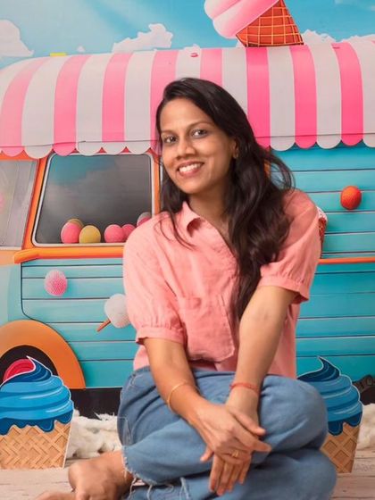 Here I am, caught matching the ice cream set. It's a glimpse into the fun and colorful world I create in my studio.