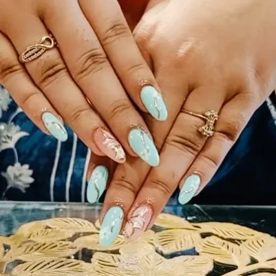 A closer look at this beautiful pastel blue and butterfly wing nail art set.