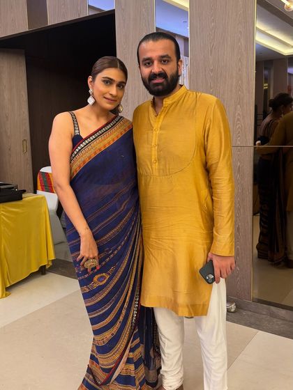 Another look at my classic blue Tarun Tahiliani saree. It's a timeless piece that I've worn to multiple events, proving the value of investing in quality staples.