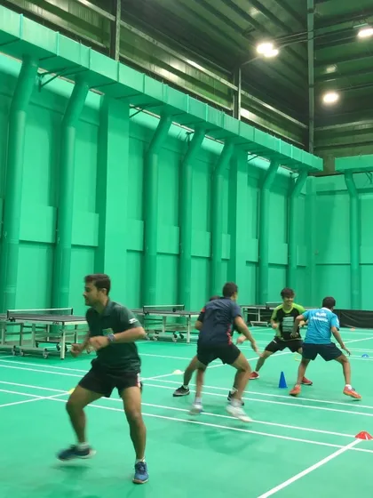 A badminton-specific reaction drill on the court.