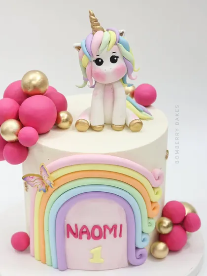 A close-up of the adorable, handcrafted unicorn figurine with a rainbow-colored mane.