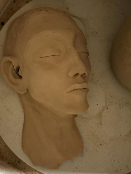 The sculpture is now ready for its first firing in the kiln. This bisque firing will turn the fragile clay into a hard, porous ceramic piece.