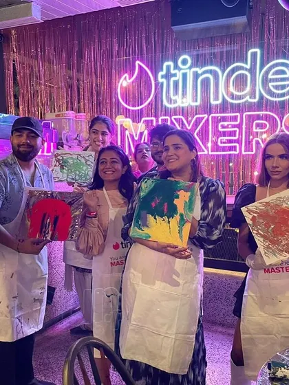 We teamed up with Tinder for a fluid art mixer and the energy was everything. It was all about meeting new people, getting your hands dirty, and creating something cool together. Look at these happy faces and their abstract masterpieces.