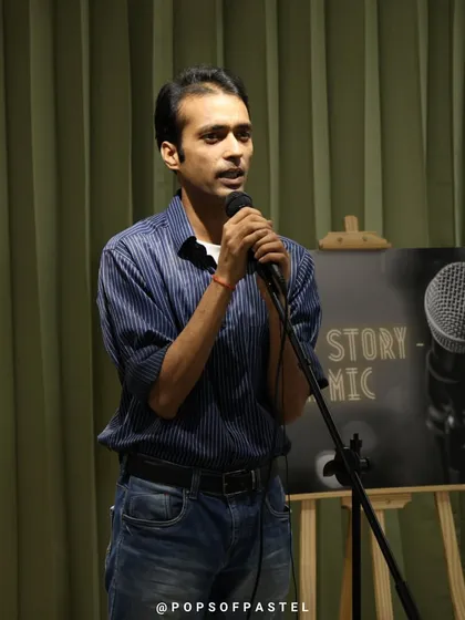 A storyteller delivering his narrative with focus and intensity.