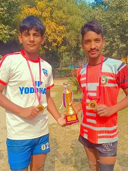 Another shot of our winning players with their gold medals and trophy. We focus on building a winning mentality through discipline and rigorous training.