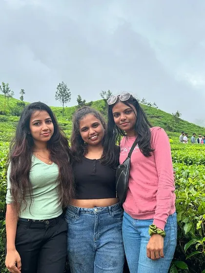 Three friends enjoying the view at the Samse Tea Estate, a picturesque location near Kudremukh.