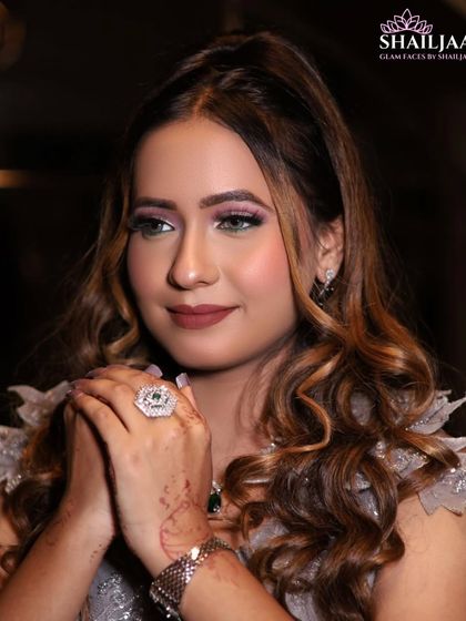 Another angle of this stunning engagement look. The soft curls and shimmery eye makeup create a look of pure elegance.