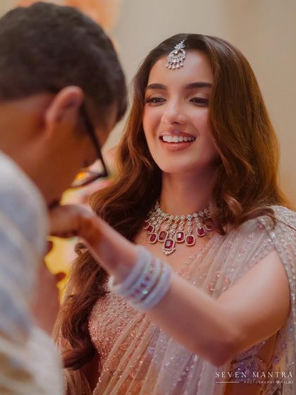 A gentlemanly kiss on the hand. A classic, romantic gesture captured in a beautiful, soft light.