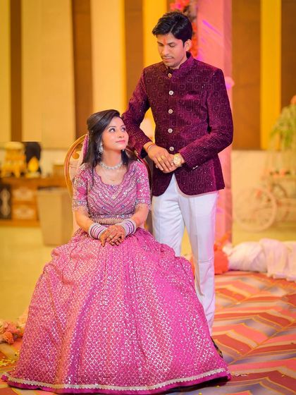 A classic seated pose for the couple during their engagement.